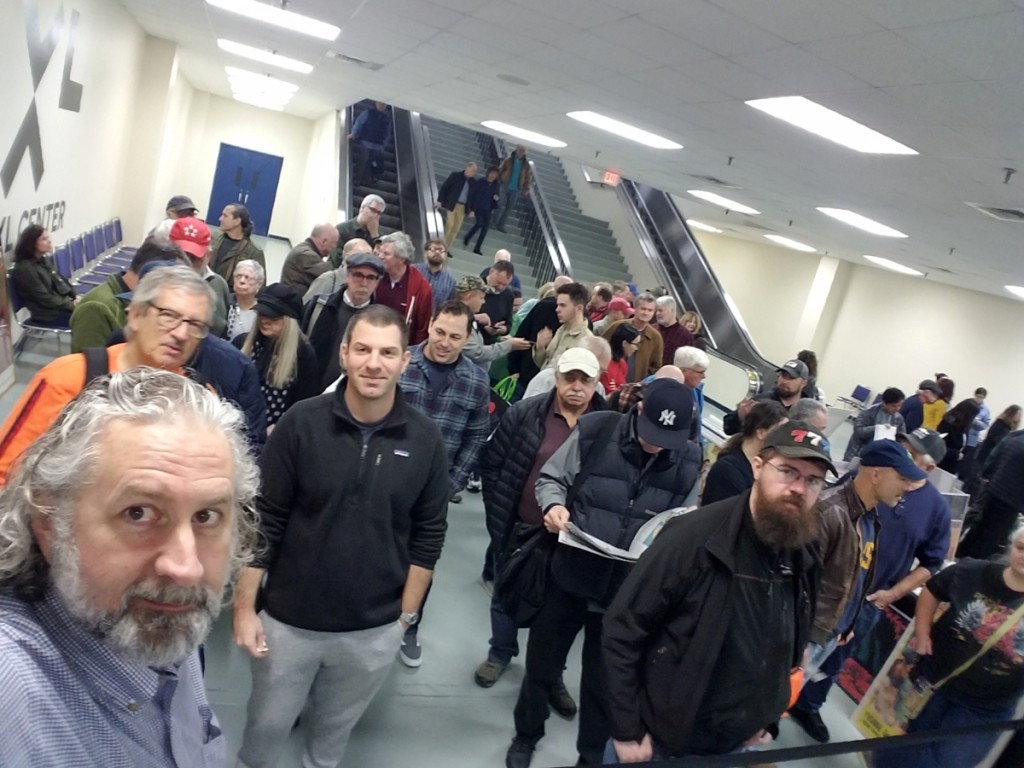 Show promoter Gary Gipstein, lower left, is about to let the crowd of paperchasers into the show in the lower level of the XL Center.