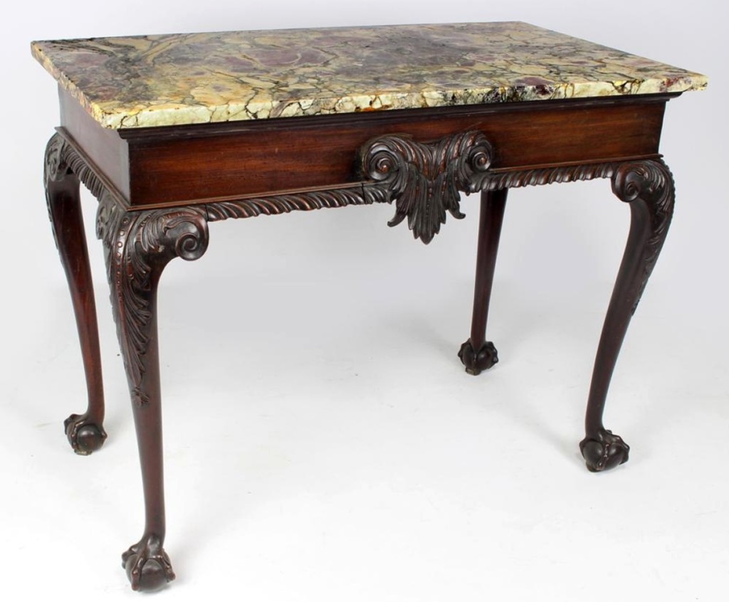 The second highest price for a piece of furniture was achieved by an Irish George II marble top table carved with a scrolling acanthus leaf on the apron, with acanthus carved knees and ball and claw feet. It ended up at $16,800