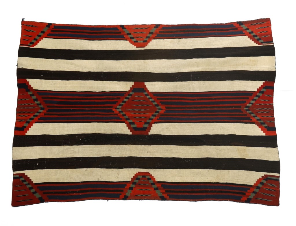 Considered to be among the best Navajo textiles, mostly due to the skill of the Navajo women weavers, third phase chief’s blankets are highly desirable, as was this circa 1865-75 example that took $30,000. Of handspun wool, natural and aniline dyes and measuring 54 by 76½ inches, the late Classic period piece featured cream, dark brown, indigo blue and green, red and bright red.