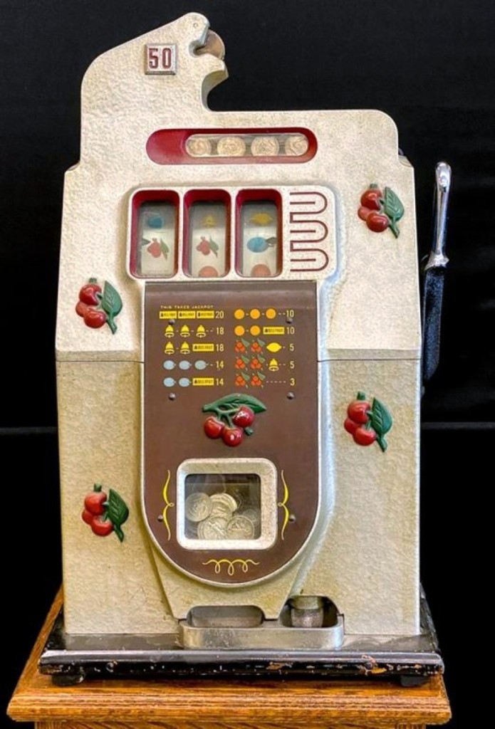 The top lot of the day was this Mills 50-cent “Black Cherry” slot machine that sold for $1,320. The case was cast metal with hammer-tone surface and raised cherries.