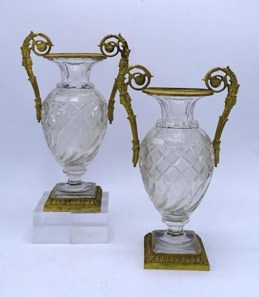 Bringing the top price of the sale was this pair of 11-inch-tall bronze and crystal urns attributed to Baccarat that realized $2,160 ($400/600).