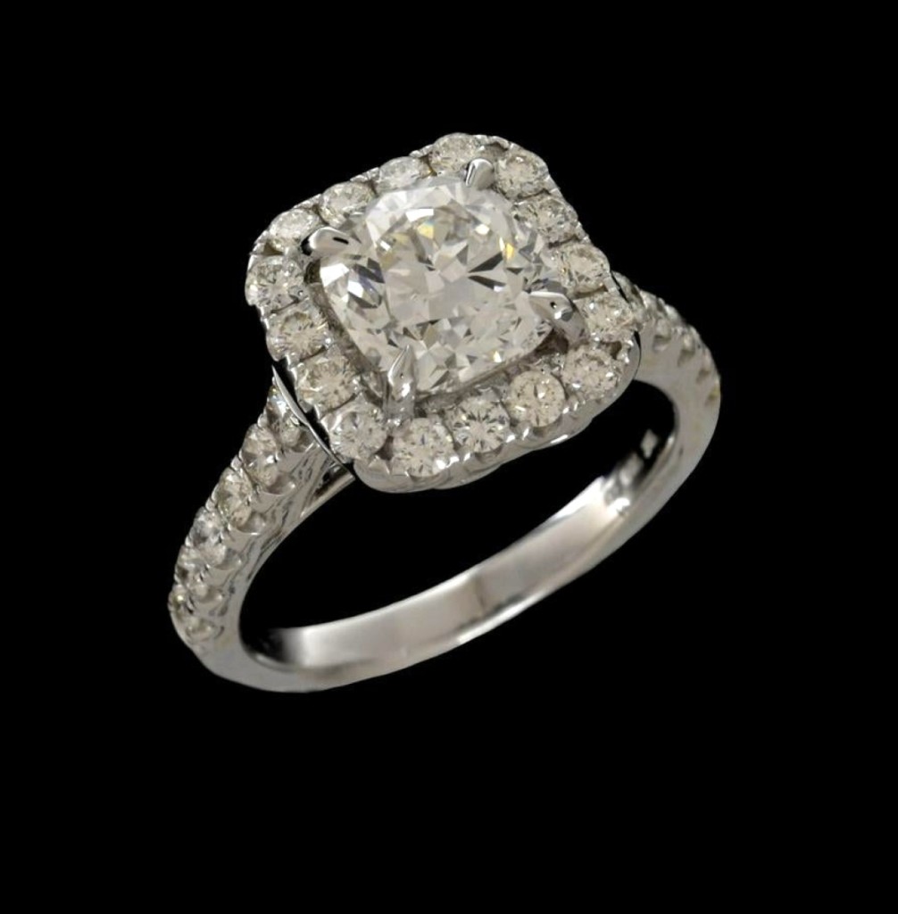 This GIA-certified 2.01-carat cushion cut diamond and 18K white gold engagement ring shared the top price of $16,940 with seven bids on an estimate of $18/25,000.
