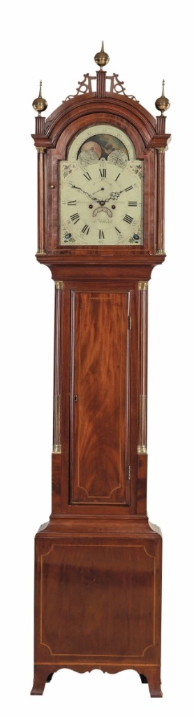 This labeled Simon Willard tall clock with an inscribed dial finished at $25,000 ($15/25,000).