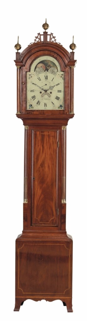 This labeled Simon Willard tall clock with an inscribed dial finished at $25,000 ($15/25,000).