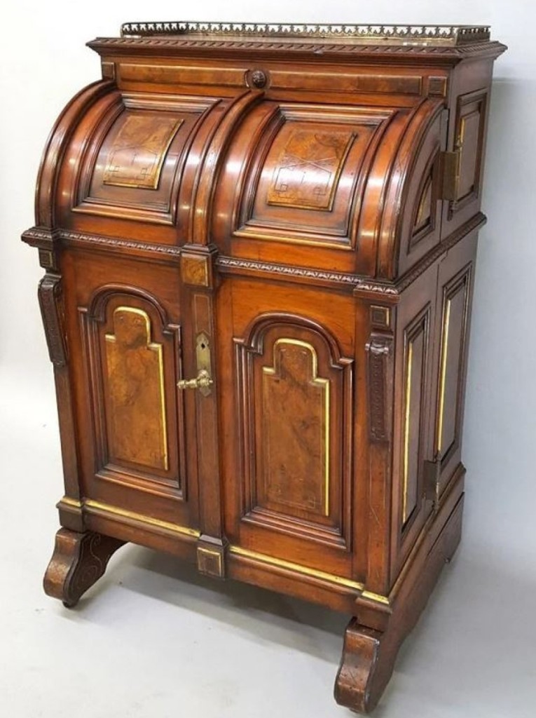 The sale’s top lot was found in this desk cabinet from the Wooton Desk Company that brought $8,338. Circa 1874, this is only the second example of this model that auctioneer Jay Anderson had ever seen.