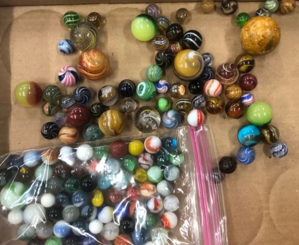 This lot of marbles, including swirls and shooters, had something good in it that only marble collectors will know. The group brought $6,765 above a $500 estimate.
