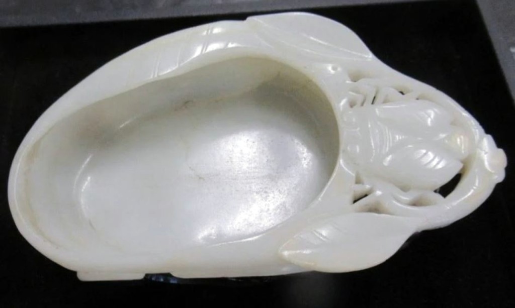 Schultz said that the carved jade scarab bowl here was owned by consignor’s grandmother and had passed down in the family. It brought $4,612 over a $500 estimate.