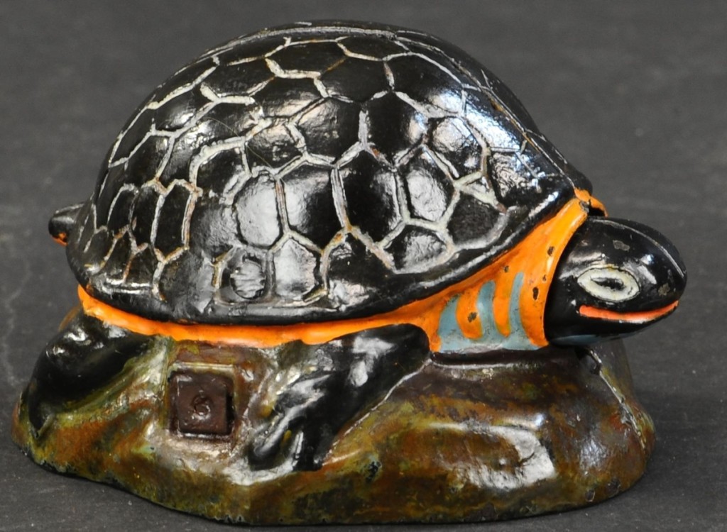 From the Bob Weiss collection came this beautifully painted Kilgore Turtle mechanical bank that took $24,000. The example was in pristine condition. When a coin is dropped into the shell, the turtle’s head pokes out.