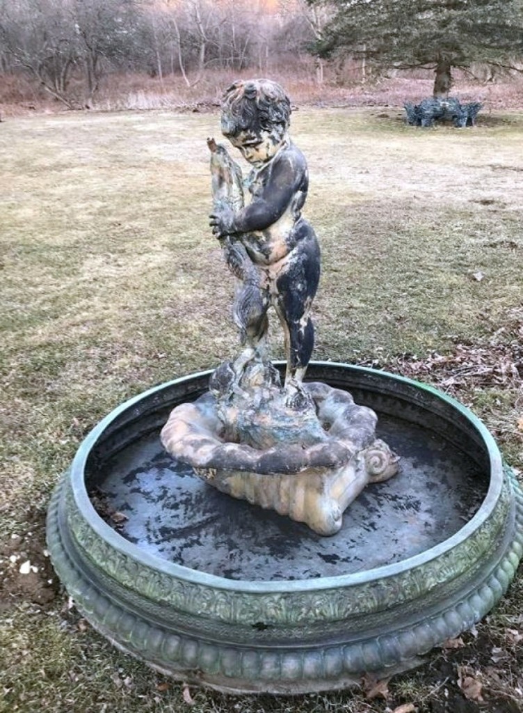 Leading the bronze offerings was this 56-inch-high fountain of a boy with a spitting koi fish. It sold for $7,995.