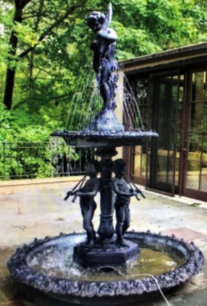 Leading the sale was this cast iron fountain, 104 inches tall, that brought $9,225. Fontaine said the buyer had a moving business and they pulled the truck up and lifted it on with a crane.