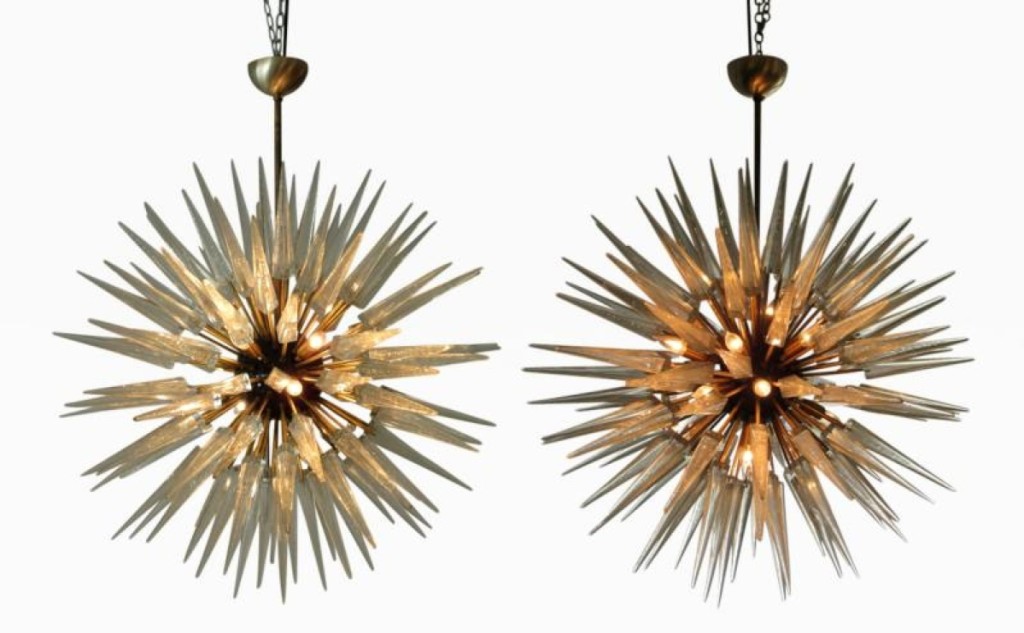 This pair of monumental Italian modern brass, enameled and hand-blown glass “Sputnik” chandeliers attributed to Murano Glass Sommerso is with Gary Rubenstein Antiques, Miami, Fla. They measure 48 inches high by 41 inches wide and date to the third quarter of the Twentieth Century. $59,500.