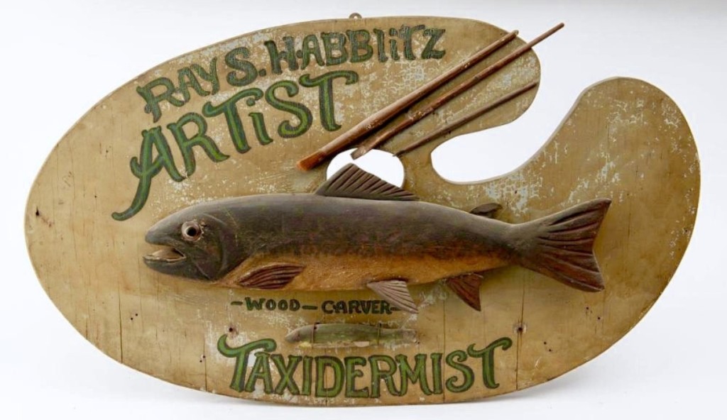 One of many sales with Jewett-Berdan was this 1920 folk art trade sign made by — and for — Ray S. Habblitz, who was an artist, wood carver and taxidermist. The unrestored sign measured 34 inches long by 20 inches tall and had been in a Massachusetts collection. Newcastle, Maine.