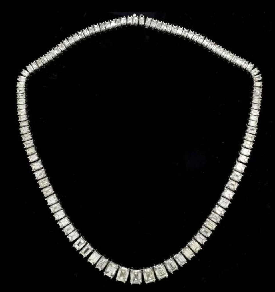 Leading the sale at $124,000 was this 60.50-carat diamond and platinum necklace with 107 graduated emerald cut diamonds, J-K color, VVS clarity. It sold to a private collector.