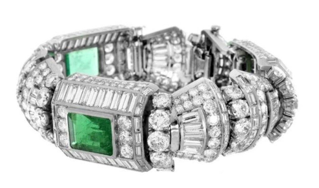 Finishing at $93,000, the second highest lot in the sale, was this diamond, emerald and platinum bracelet with 58.0 carats of round brilliant and baguette cut diamonds and three Colombian emeralds at 12.0 carats total weight.
