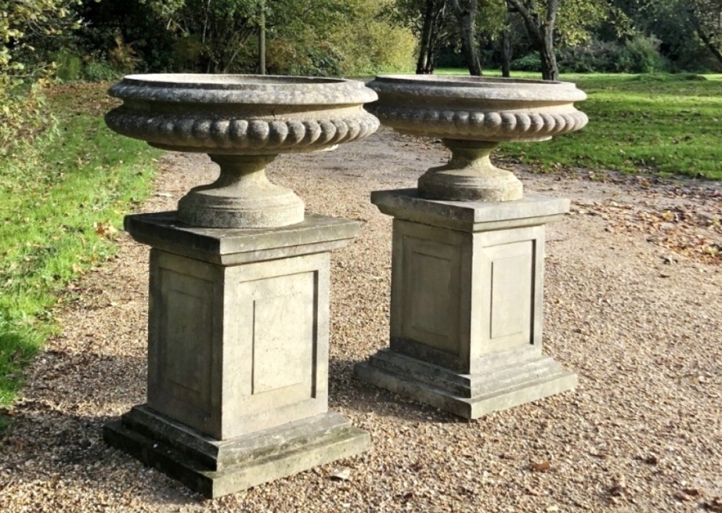 Judy and James Milne, At Home Antiques and Design, Kingston, N.Y., offered this pair of cast stone tazza urns on their original pedestals, circa 1950 from Sussex, UK. They measure 30 inches diameter by 40½ inches high.