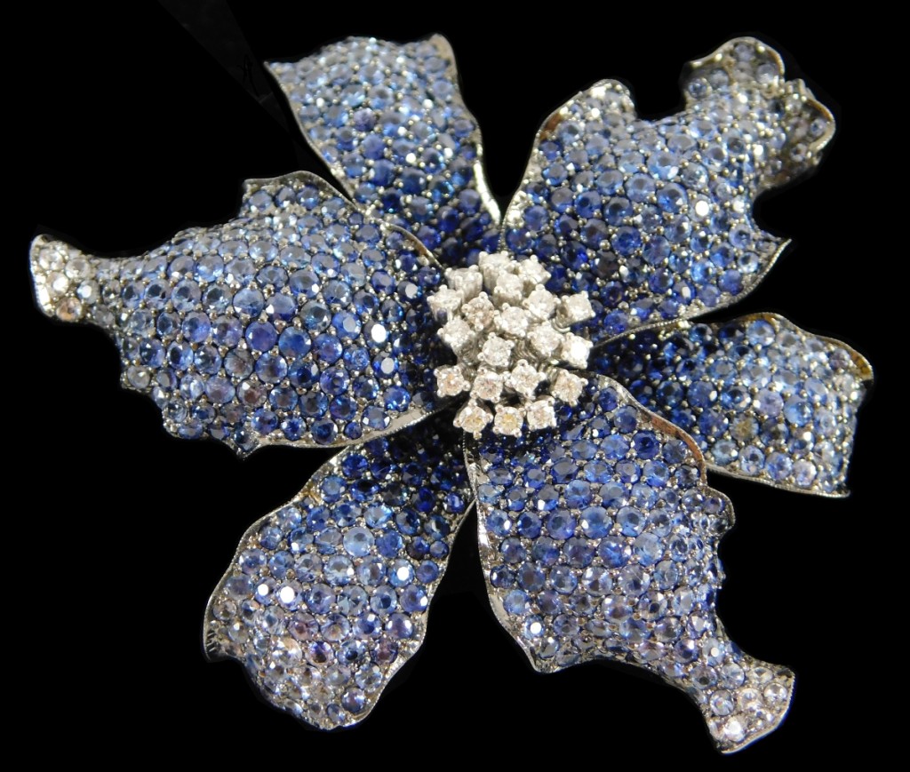 An 18K sapphire and diamond brooch achieved $2,600 against an estimate of $800-$1,000.