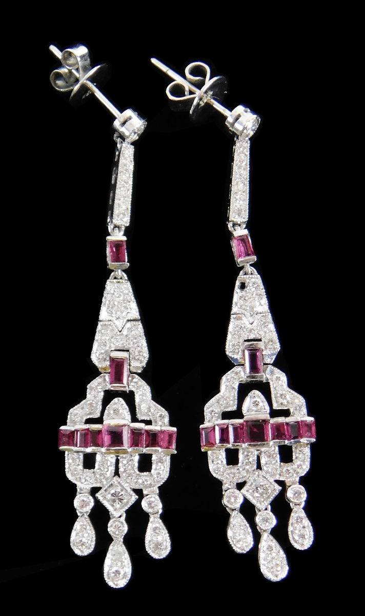 Nearly doubling its high estimate, this pair of 18K Art Deco-style ruby and diamond drop earrings brought $1,000.
