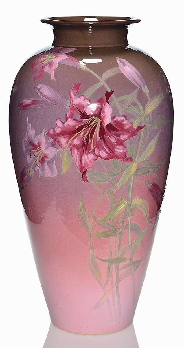 Tying for the sale’s top lot was a Weller Eocean vase painted by Albert Haubrich in 1904. It was made for the St Louis World’s Fair that year and was purchased at the fair by brewing magnate Adolphus Busch. It descended in the Busch family through three more generations and was sold to its consignor, Marvin and Jeanette Stofft, in 1988 when they purchased it from the Busch sale. It took $25,830.