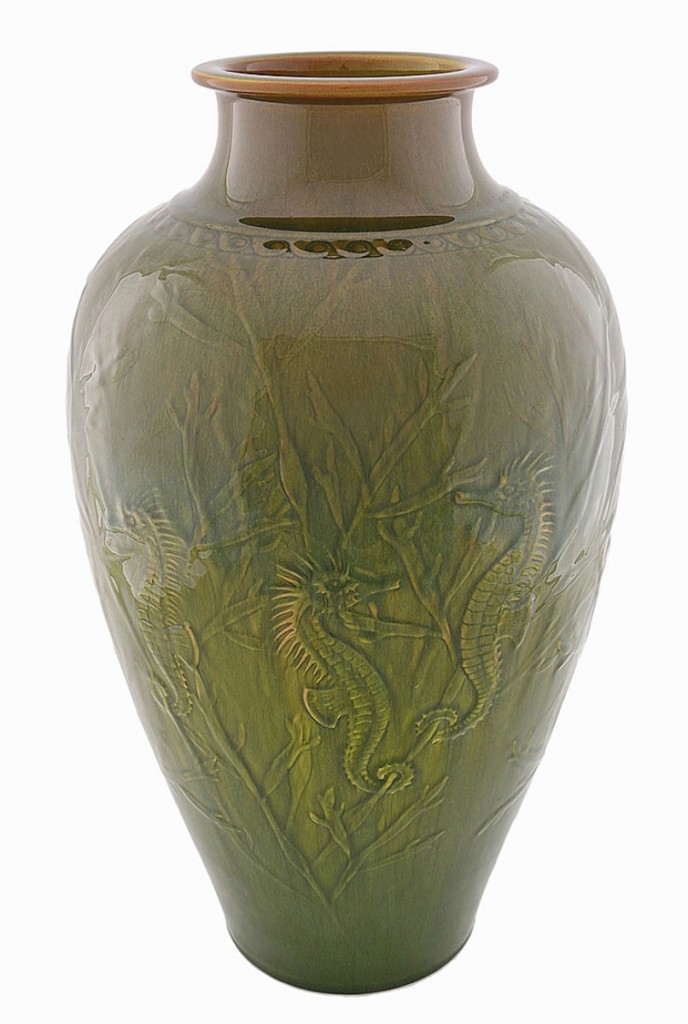 Humler said this was a very rare piece and it sold commensurately at $20,650. Rookwood Aventurine glaze vase, 16 inches high, painted in 1921 by Kataro Shirayamadani. The design features seahorses and seaweed.