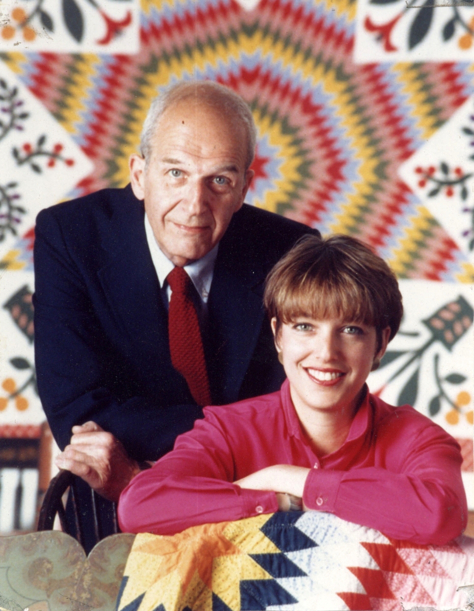Morris and Amy Finkel in the mid-1980s with antique quilts, prior to specializing in the field of antique schoolgirl samplers.
