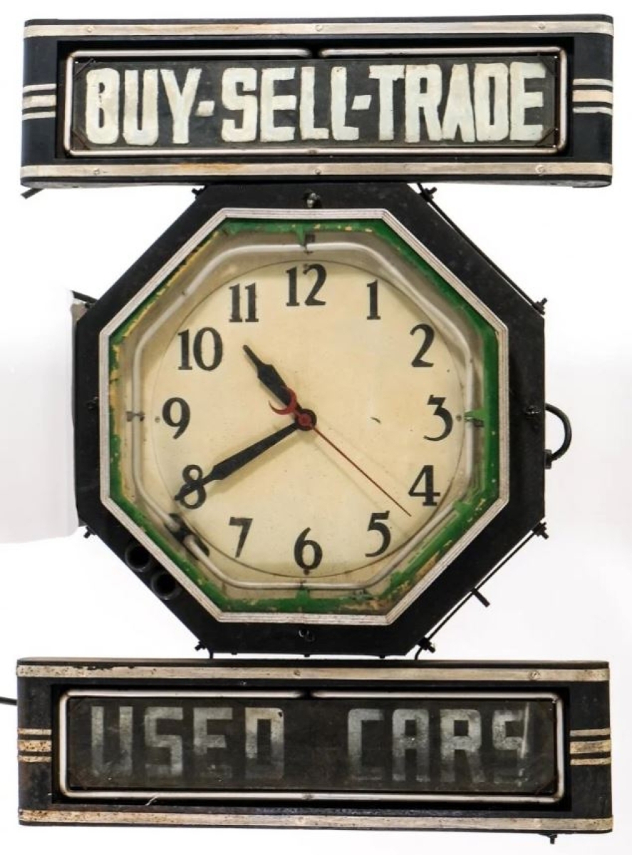 The sale’s top lot was found in this used car neon clock trade sign that sold for $3,198. It had original black paint and green neon.