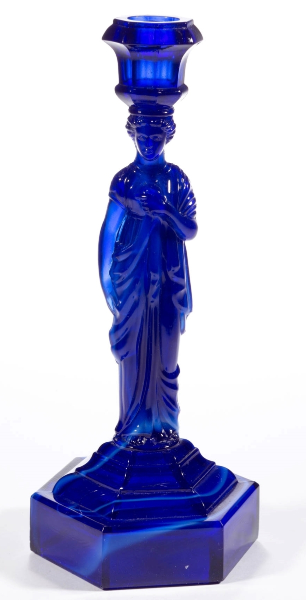 Pressed Caryatid candlestick in a unique color, $7,020.