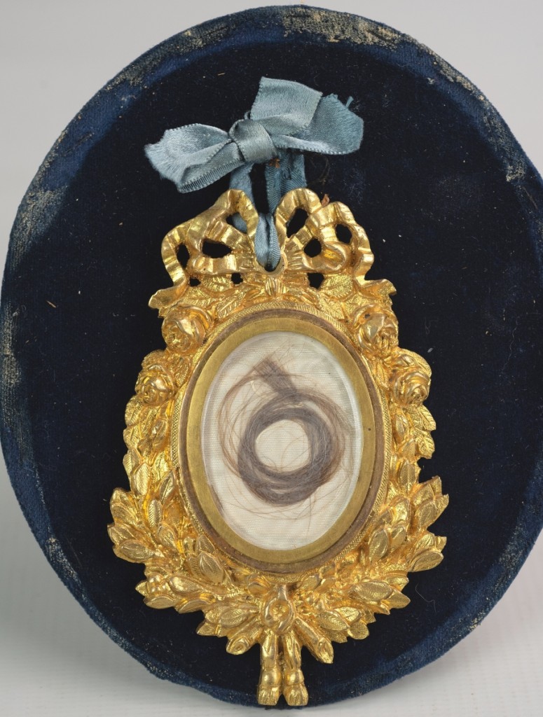 A substantial lock of George Washington’s (1732-1799) hair framed and encased in an ornate gilt-metal locket was bid to $30,000.