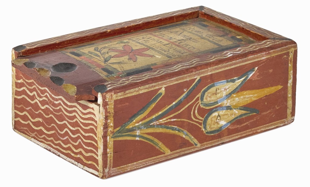 The sale’s top lot was found in a diminutive paint-decorated pine slide lid box by John Drissel (Pennsylvania, 1762-1846) that sold for $137,000, setting an auction record for any box by the maker. It sold to a Pennsylvania private collector. The box rose only 2¾ inches off the ground, 4- wide and 7- deep. It was inscribed “Zum gruck Ann von Red John Drissel his hand 1796,” dedicated to Anna Von Red, or Anna Roth, who is listed in the New Goschenhoppen Register as born November 17, 1793. Only about half of Drissel’s known works are signed and this example, with its sweet size, bright paint and impeccable condition, is regarded as among the finest known.