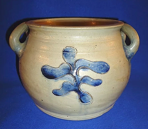 Duane Watson of Doc's Crocks, Ashland, Ohio, has said he will adjust his offerings for any future show.  Still, this one was nice to see, a low New York open-handled stoneware pot.  It is 5¾ inches high, circa 1800. 