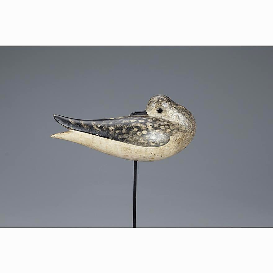 A sleeping black bellied plover by Melvin Gardner Lawrence, a Revere, Mass., carver, brought $42,000. Perhaps no more than 12 examples of his work are known.