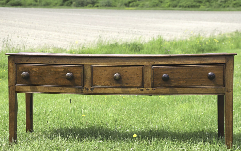 A three-drawer console table had interesting dovetail construction and earned $1,845.