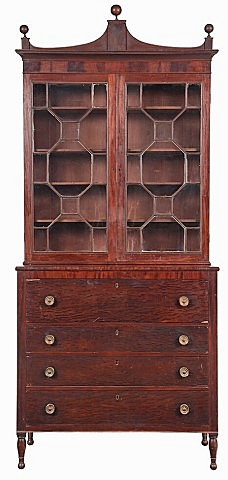 This circa 1815 Federal desk and bookcase with sophisticated form and construction, that together suggested an urban origin, had not been known before it came to market at Brunk Auctions. It descended in the family of its original owner, Benjamin Leigh (1761-1830) of Augusta, Ga., and was accompanied by an engraved silver pocket watch and two embossed leather pocketbooks, one of which contained three Confederate notes. Competition on the lot came from some of Georgia’s top collectors, all bidding by phone. It sold for $56,580 ($12/18,000).
