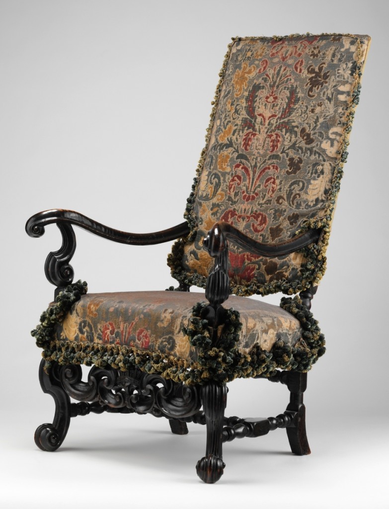 Armchair, one of a pair attributed to Thomas Roberts (active 1685-1714), circa 1700. Ebonized beechwood, original Genoese velvet covers; 48 by 28 by 32 inches. Purchase, Gift of Irwin Untermyer, by exchange, and bequests of Bernard M. Baruch, Ruth Mabee Lachman Greenleaf, and Irwin Untermyer, by exchange, 1998.