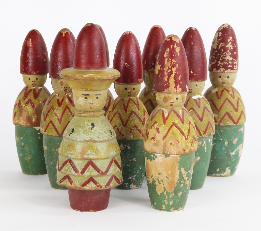 Folk art clown skittles, American, early Twentieth Century scored a sale by John Chaski.