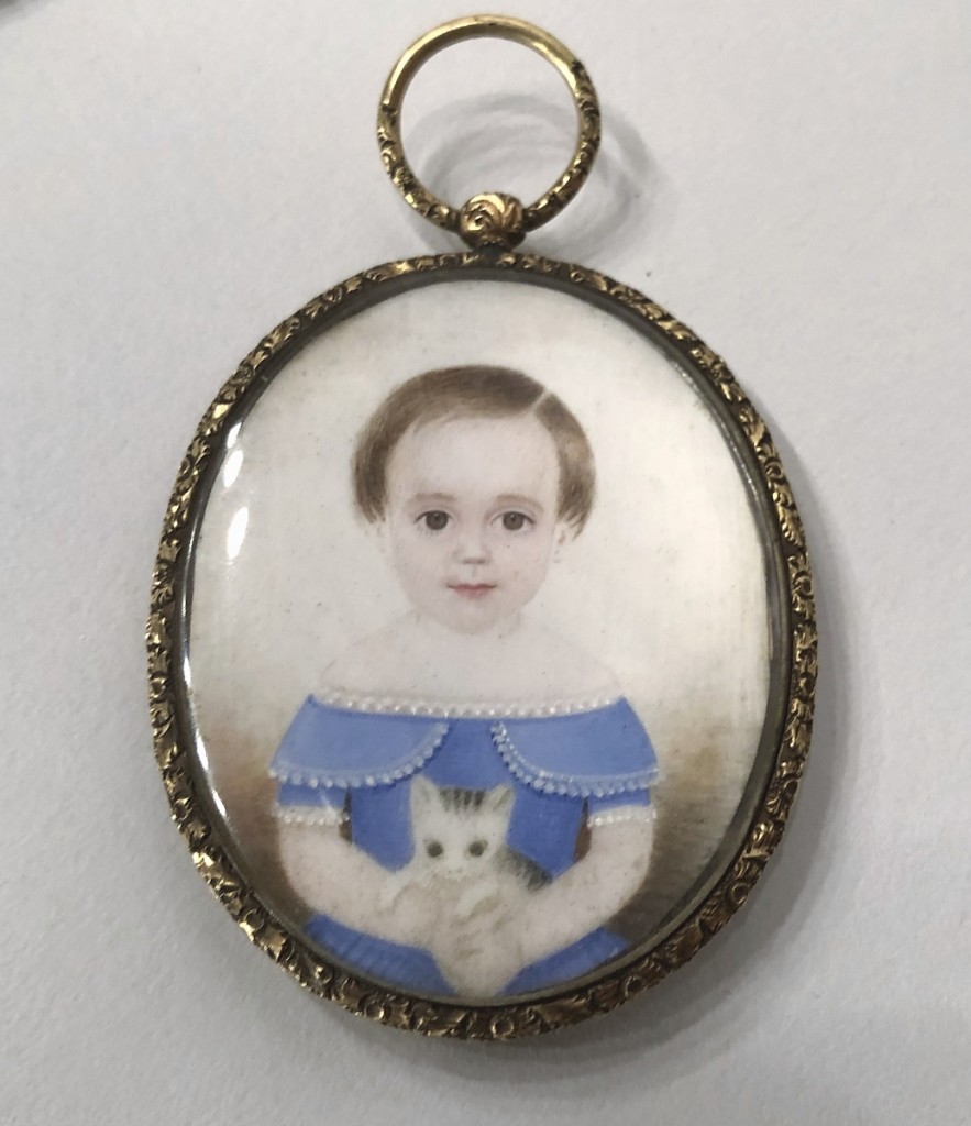 Hercules Pappachristos sold these Wilson family portrait miniatures from Boston, Nineteenth Century. Shown were a young husband and wife and their child in a blue dress holding a kitten. They were purchased directly from the family.