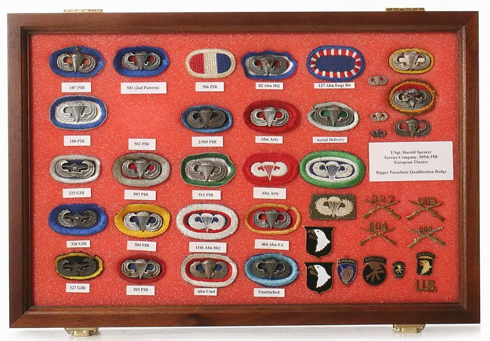 Catching $2,147 was this grouping of 25 scarce airborne ovals and gilder wings. Some of them were named, which adds to desirability.
