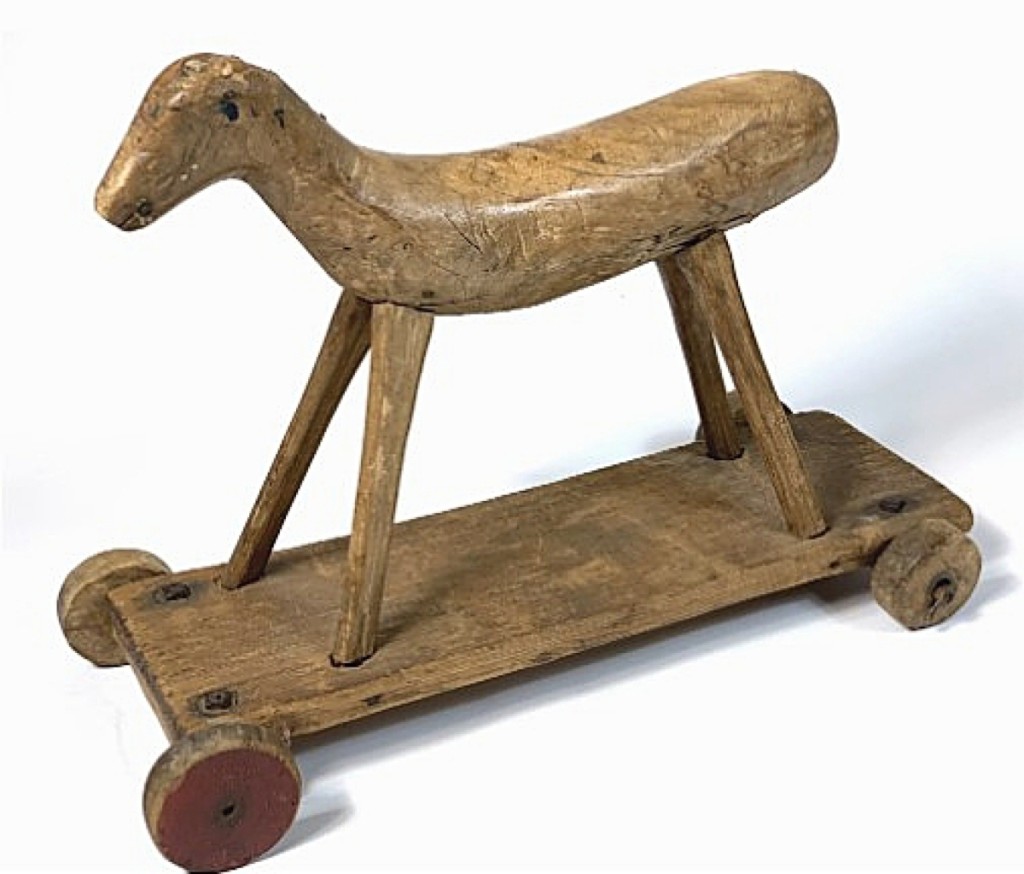 This primitive horse on wheels was a sale with South Road Art & Antiques, Stanfordville, N.Y.