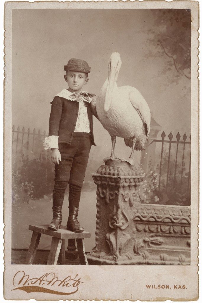 “My first baby friend Tompie and his pet” by W.A. White, Wilson, Kan., 1896.   Collodion silver print. Robert E. Jackson Collection.