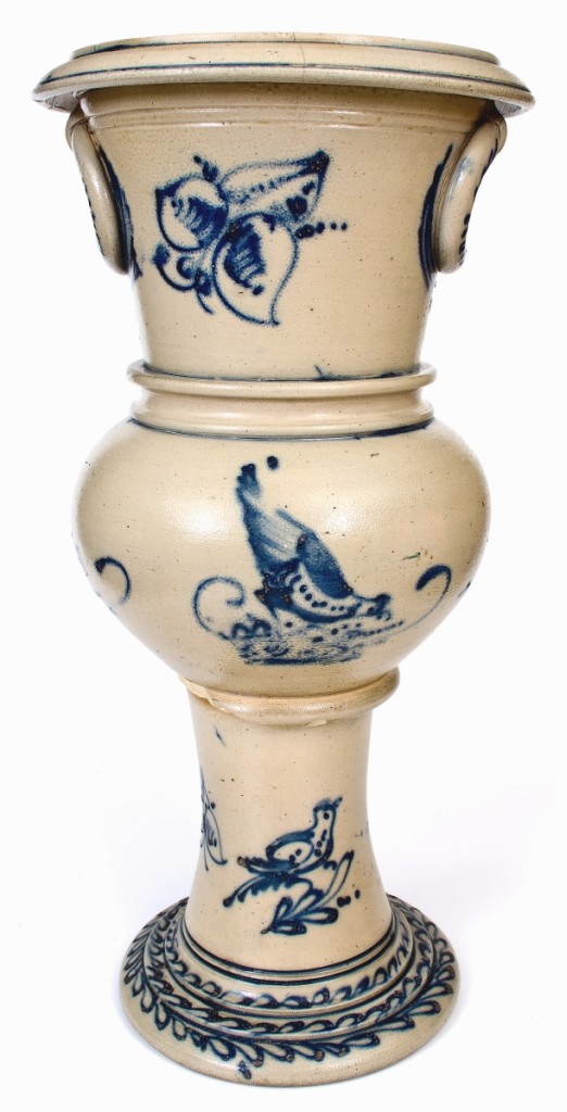Intended for outdoor use, a monumental cobalt-decorated stoneware urn with chicken pecking corn, bird and foliate motifs, attributed to New York Stoneware Co., Fort Edward, N.Y., circa 1875, stood 34 inches tall, ranking it among the tallest examples of American stoneware that Crocker Farm has ever offered. It more than doubled its high estimate at $42,000.
