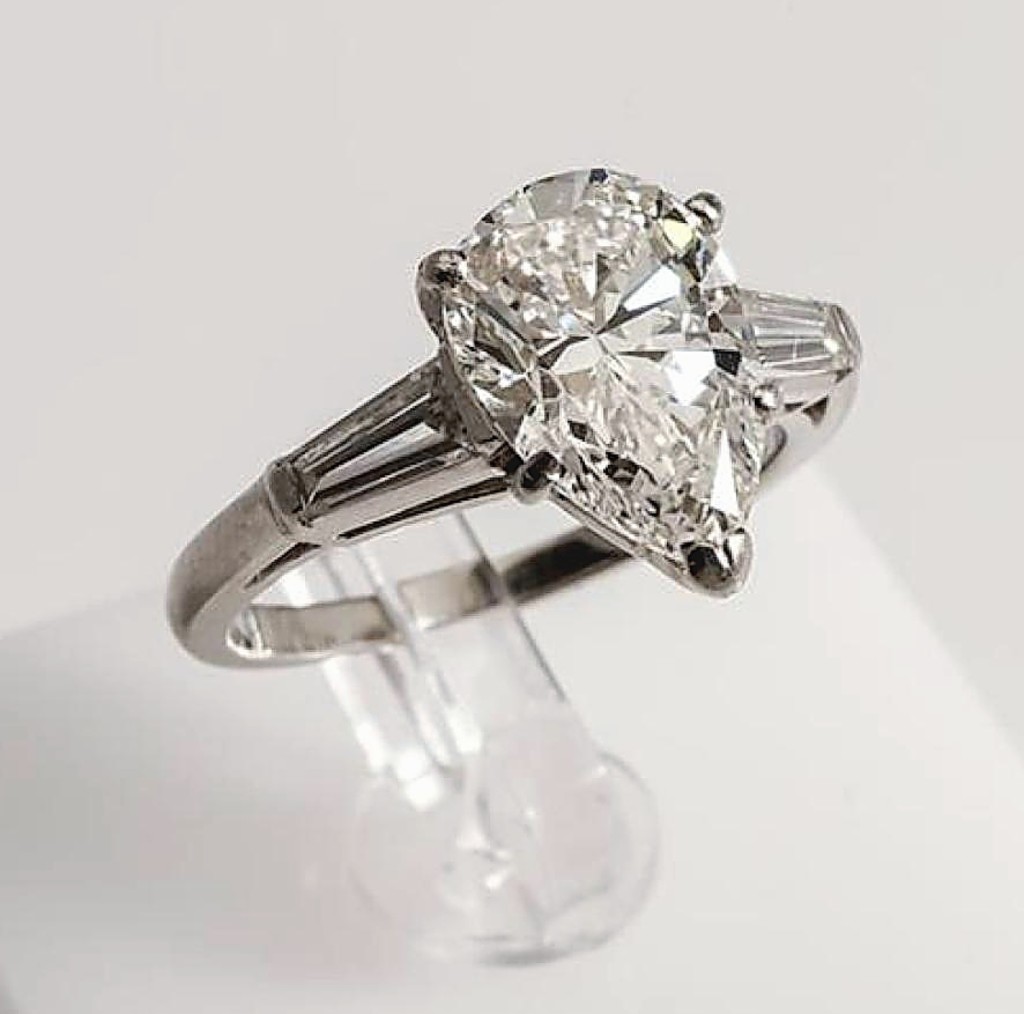 According to Mark Weschler, “the demand for large high-quality diamonds also remains steady.” Leading a solid section of jewelry was a 2.26-carat diamond and platinum solitaire ring with pear-cut center stone flanked by tapered baguette-cut diamonds. The ring saw significant competition on the phones, selling within estimate for $13,420 ($10/15,000).