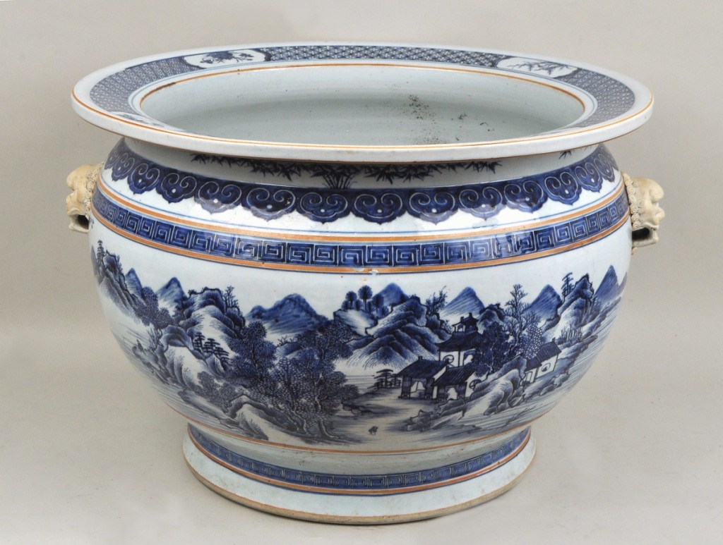 This large Chinese blue and white garden planter decorated with landscape scenes and applied lion mask handles, 17 inches high, 24-inch diameter, was the sale’s top lot, selling for $19,520.