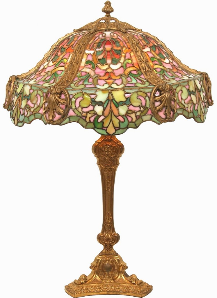Duffner and Kimberly leaded lamps rivaled Tiffany in the quality of their workmanship. This colorful Louis XIII-style table lamp on an elaborate base with a 20-inch-diameter shade reached $33,275.