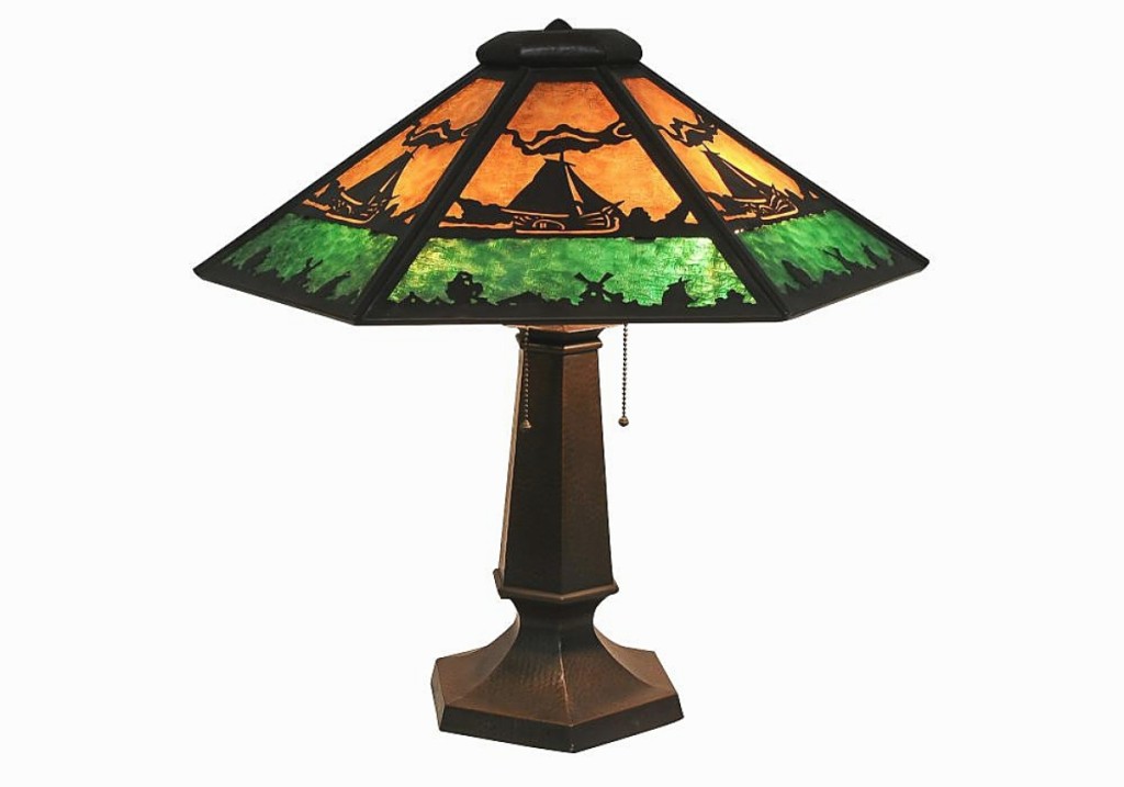 “It had strong interest,” Baratta said of this Limbert Studios hammered copper and slag glass shade with hammered copper base, the shade with sailing ships and windmills. It finished at $8,400 from an American phone bidder ($3,5/5,000).