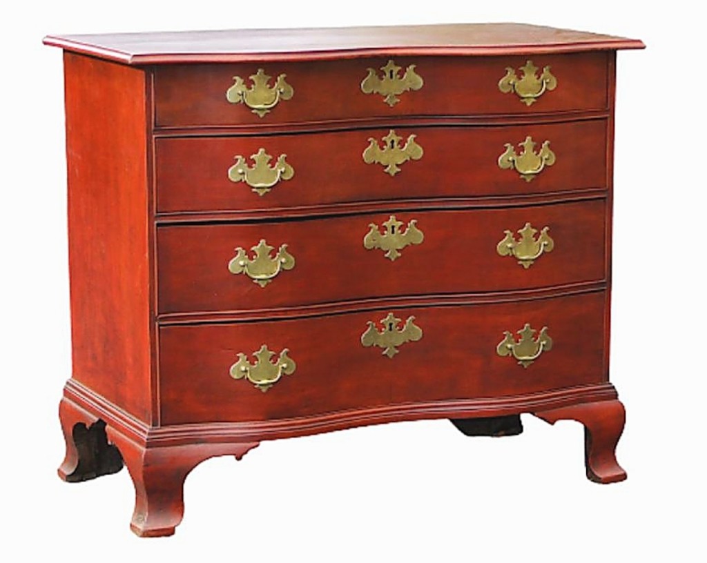 A buyer in New England liked the pleasing dimensions and clean lines of this circa 1770 Chippendale oxbow cherry and maple chest of drawers; it realized $4,500 ($ ,000).