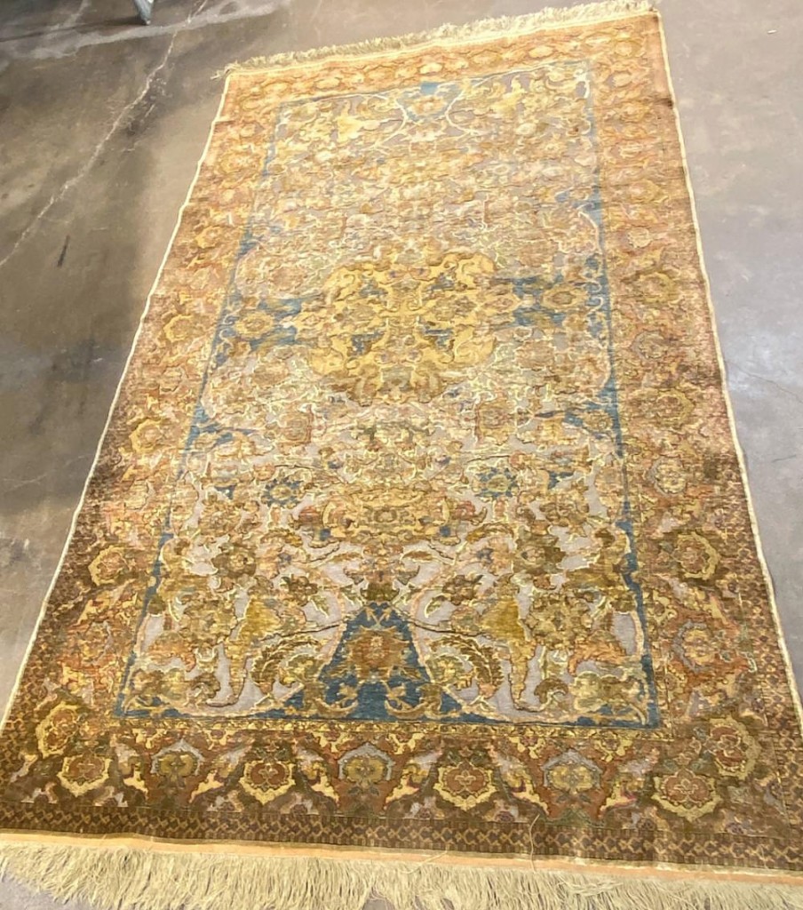 A Turkish Kum Kapi prayer rug with gold threads rose to $60,800.