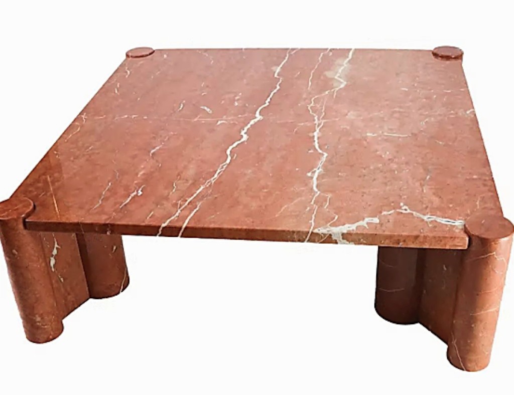 This Gae Aulenti for Knoll jumbo table with Rosso Alicante marble tops, supported on four individual column supports was tied for top lot in the sale, realized $14,000.