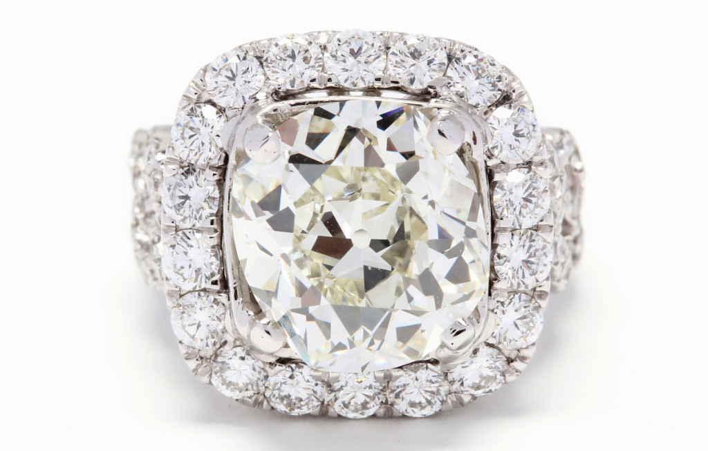 The sale’s top lot, an 18K white gold and cushion brilliant cut diamond ring with a 6.20-carat center stone, finished at $44,840.