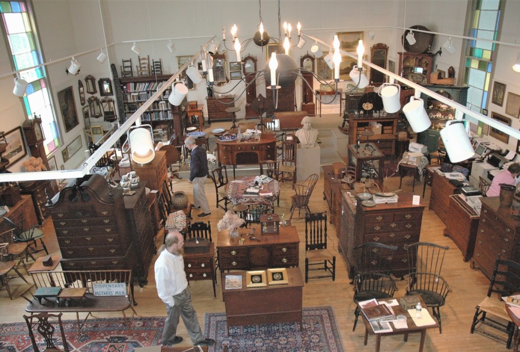 The view from the mezzanine at Nathan Liverant and Son, which maintains a large inventory of antique American furniture and accessories.