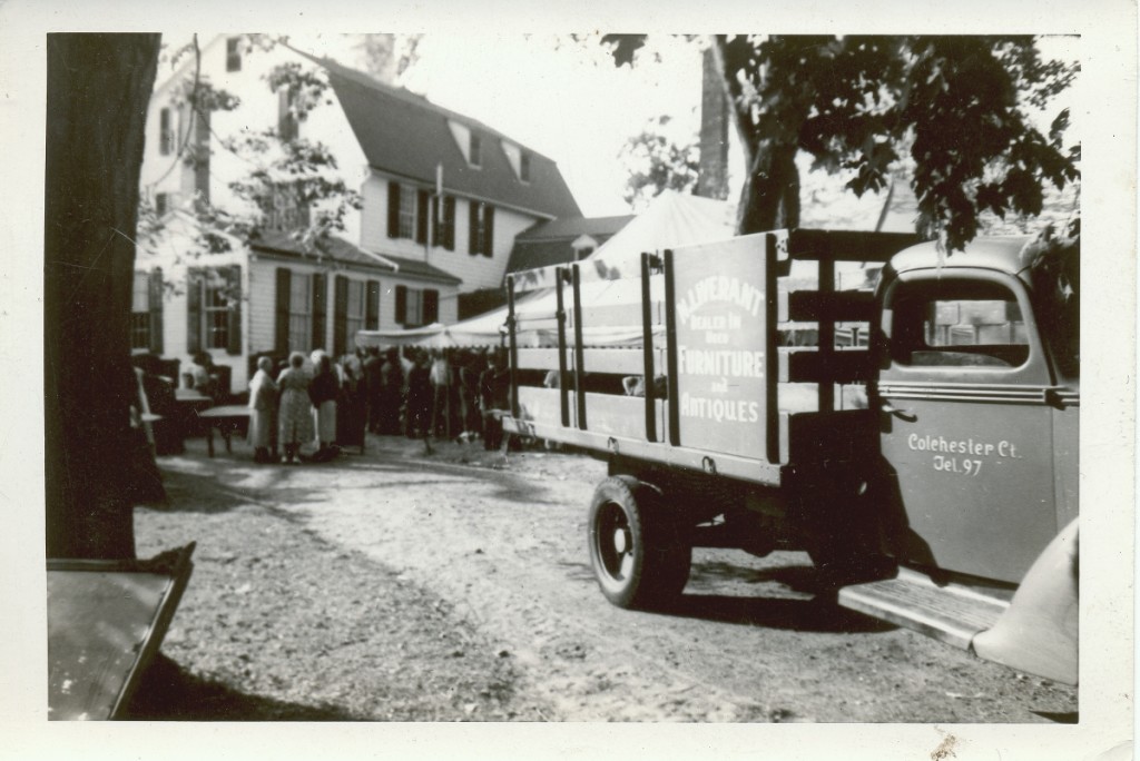 Nathan Liverant arrived from Russia in 1907 and by 1920 established himself as a dealer in used and antique furniture. He also conducted the occasional auction, as this 1941 photo illustrates.