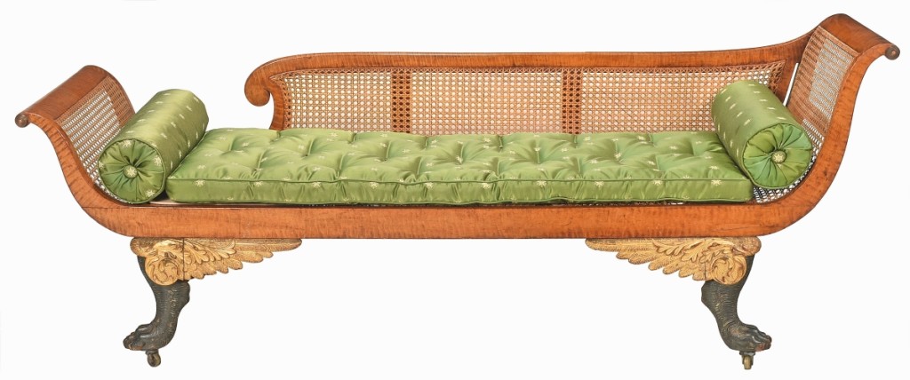 Andrew Brunk admired this elegant Grecian sofa, $135,300 ($20/30,000), combining figured maple with gilt and vert antique detail. It was probably made in New York, circa 1815-20, for the Charleston, S.C., market. A related Grecian sofa of figured maple and grained rosewood is in the collection of the Museum of Fine Arts, Boston.